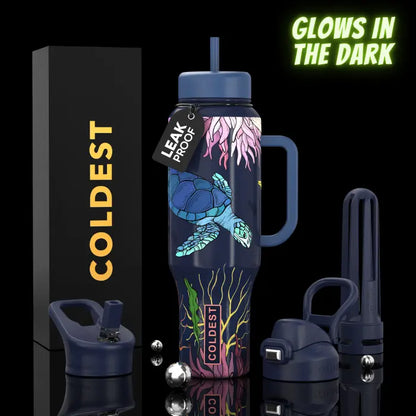 Glow-in-the-dark turtle water bottle with leak-proof lid, handle, and COLDEST branding, ideal for trendy tech and e-girl fashion lovers.