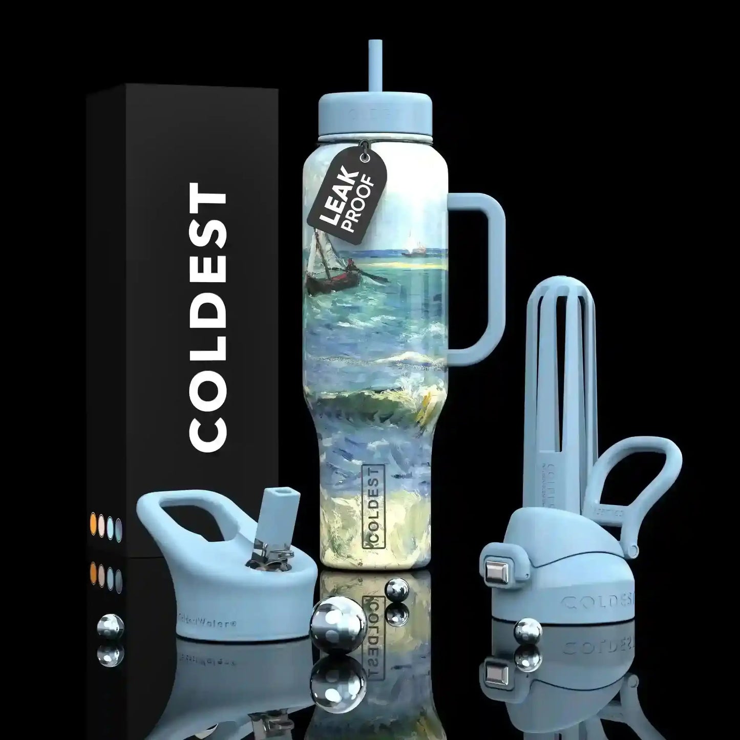 Leak-proof COLDEST water bottle with ocean art, handle, straw, and accessories on black background