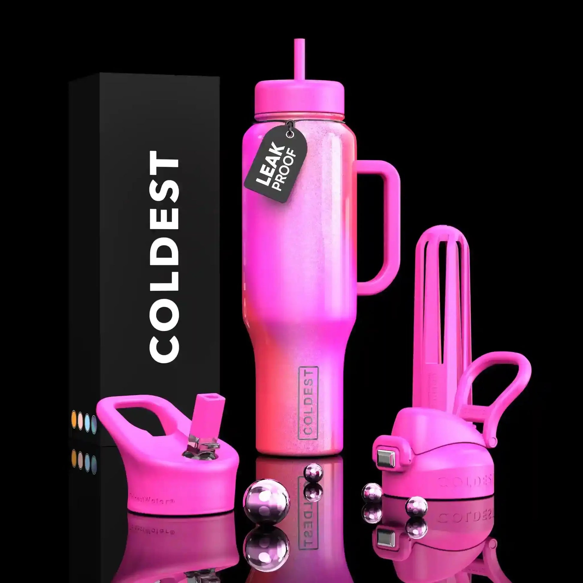 Pink COLDEST leak-proof water bottle with straw lid, handle, and accessories, shown with packaging