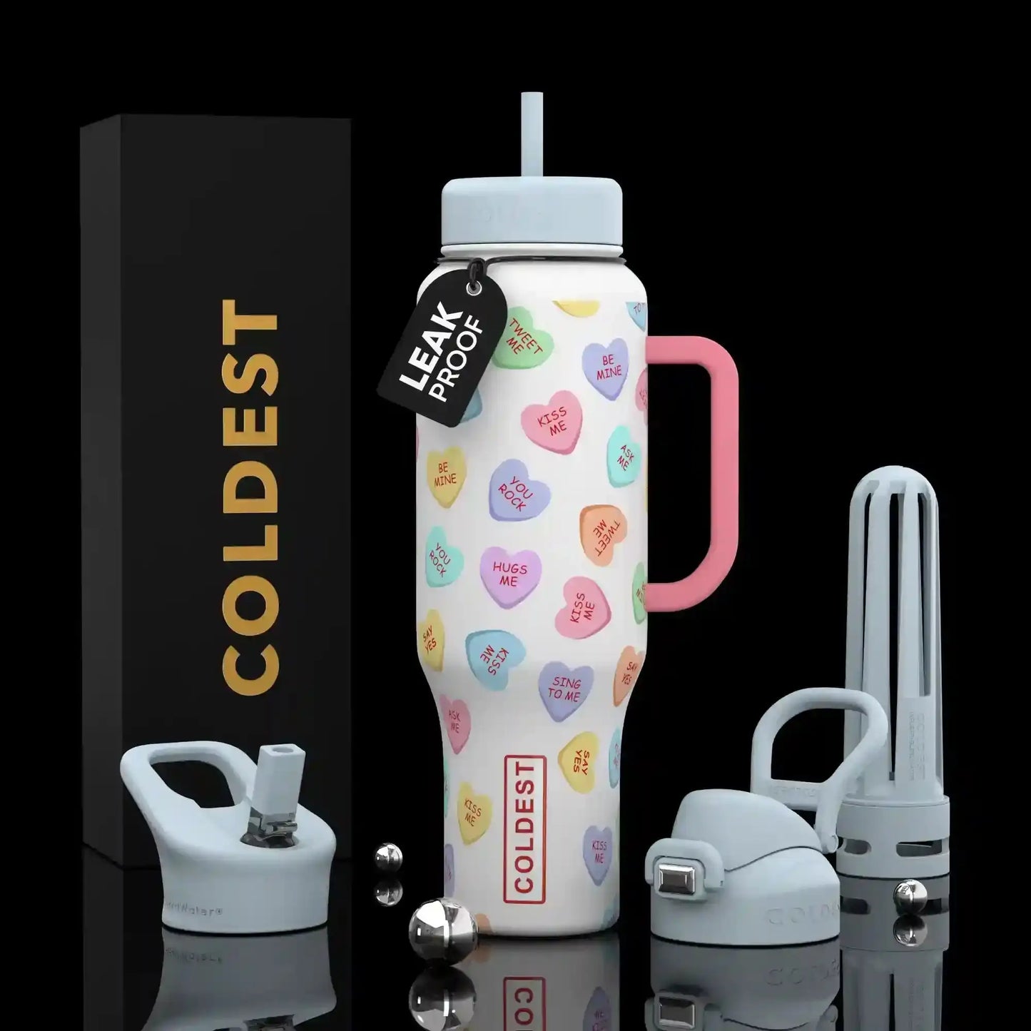 Leak-proof water bottle with candy heart print, pink handle, and straw lid, shown with accessories and COLDEST box.