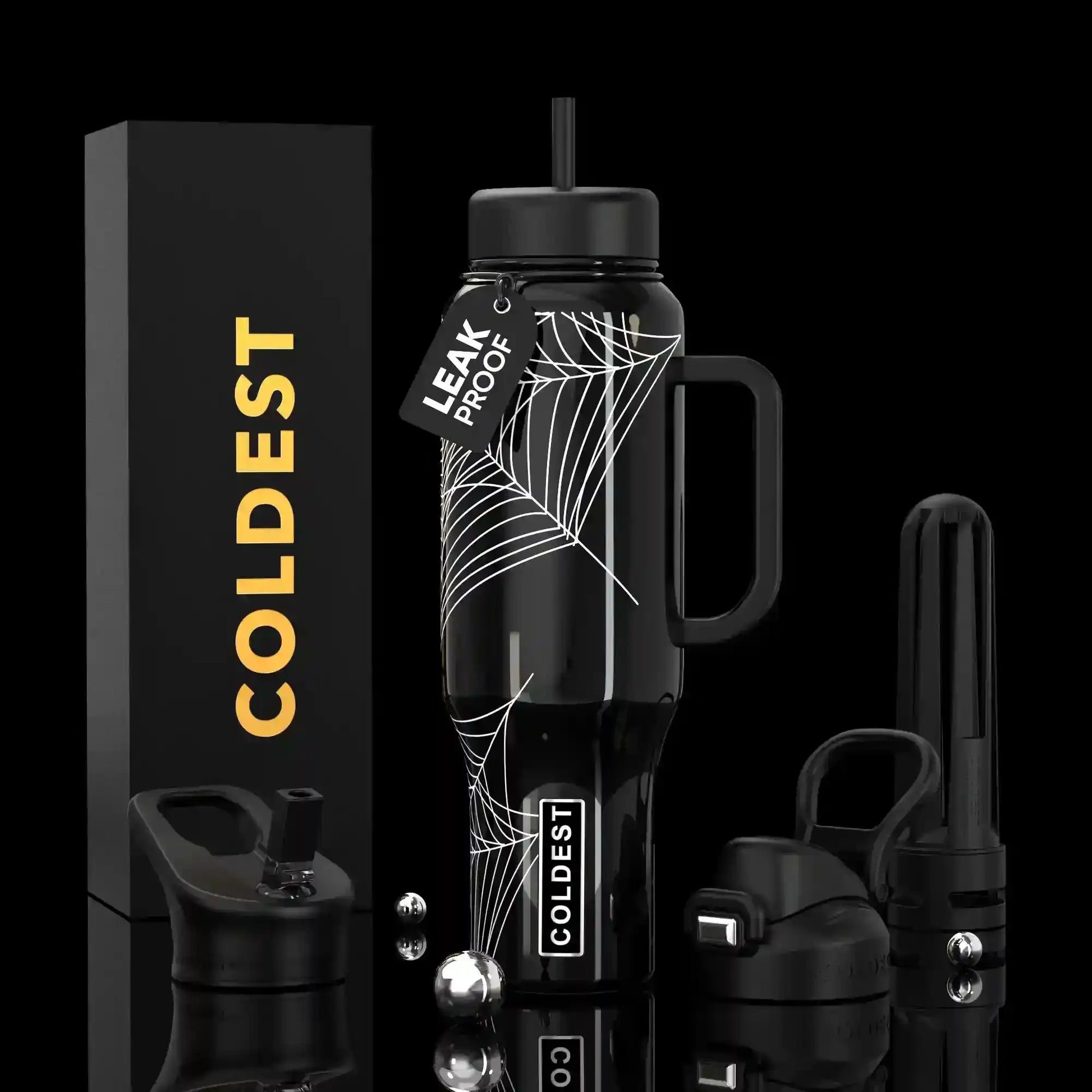 Black spiderweb water bottle with leak-proof lid, handle, and straw, styled with COLDEST branding and accessories.