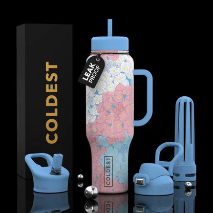 Floral print leak-proof water bottle with blue lid, handle, and straw, plus extra caps and packaging