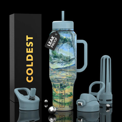 Leak-proof Coldest water bottle with artistic landscape print, handle, straw lid, and infuser, shown with packaging and accessories