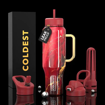 Red marble COLDEST water bottle with gold handle, leak-proof tag, and accessories on black background