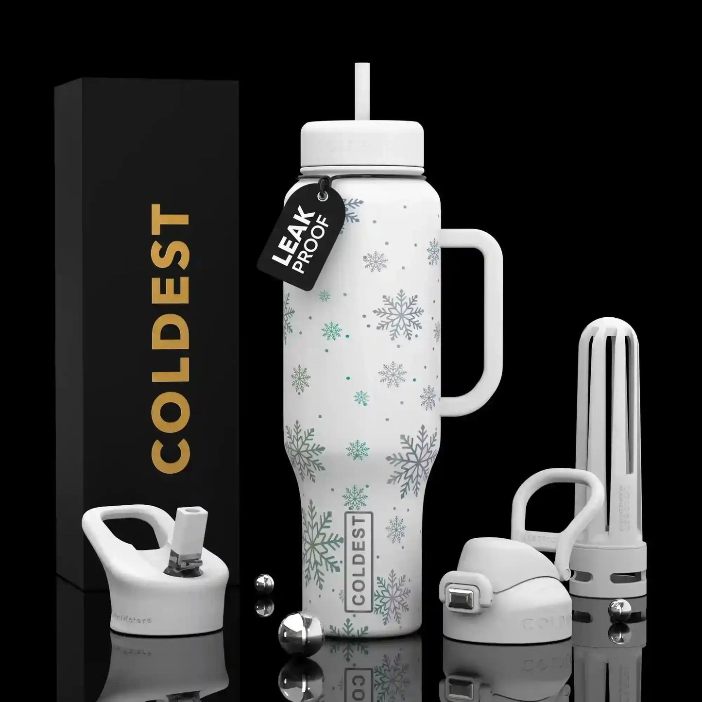 White snowflake-patterned leak-proof water bottle with handle, straw lid, and accessories, next to COLDEST box
