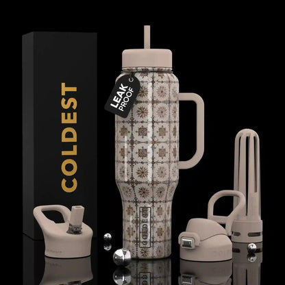 Leak-proof patterned water bottle with handle, straw lid, and accessories, styled with COLDEST box