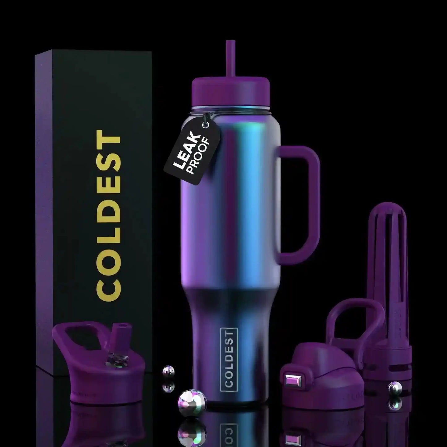 Iridescent purple COLDEST leak-proof travel tumbler with handle, straw, and accessories on black background