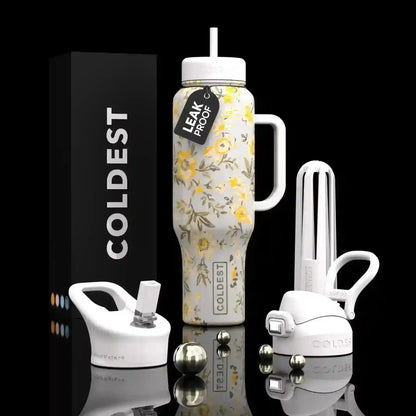 Leak-proof floral water bottle with handle, straw lid, and accessories, ideal for trendy hydration on the go.